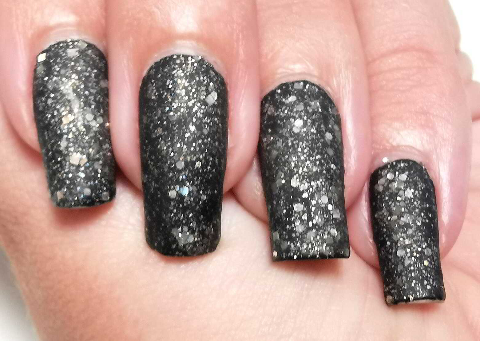 Nail polish manicure of shade Embellish Black, Holo Taco Smokeshow,OPI Matte Top Coat