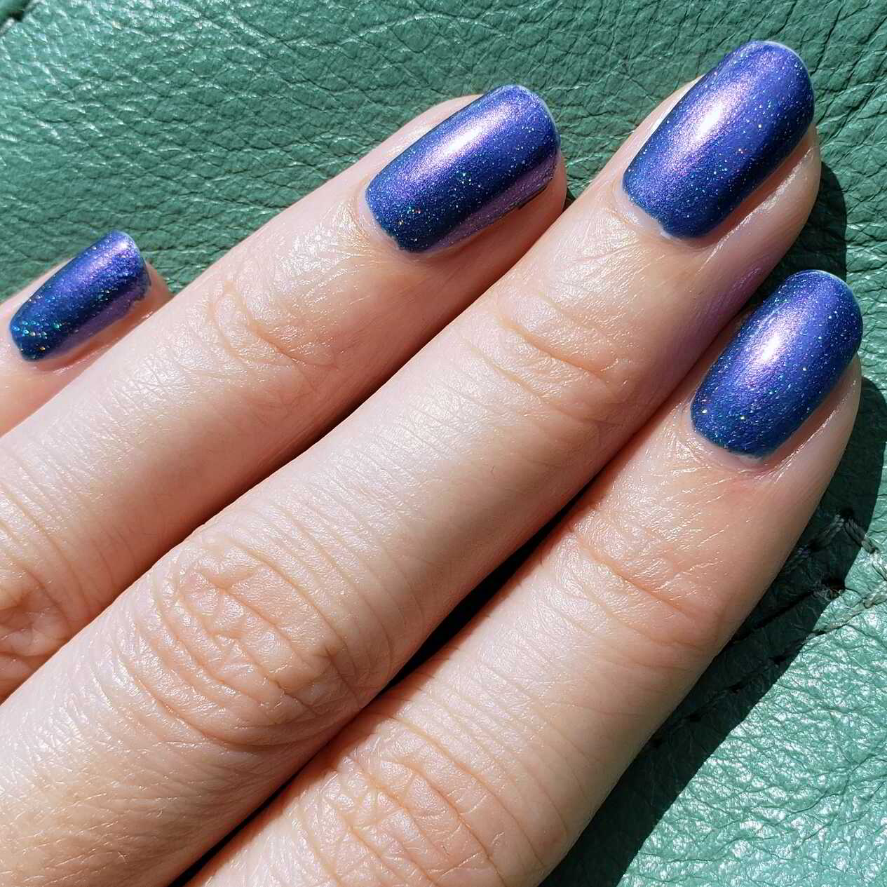 Nail polish manicure of shade Starrily Violet Twilight, 