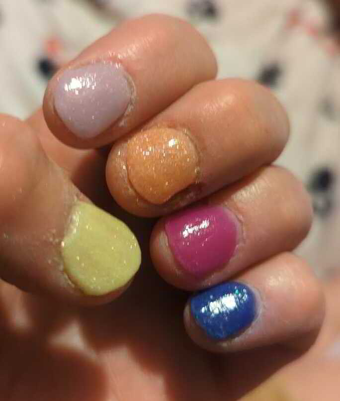 Nail polish manicure of shade Revel Glimmer, Revel Think Twice, Revel Flip Flop, Revel Blink, Revel Candy Corn 3, 