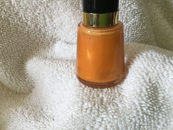 Nail polish swatch / manicure of shade Revlon Tangerine