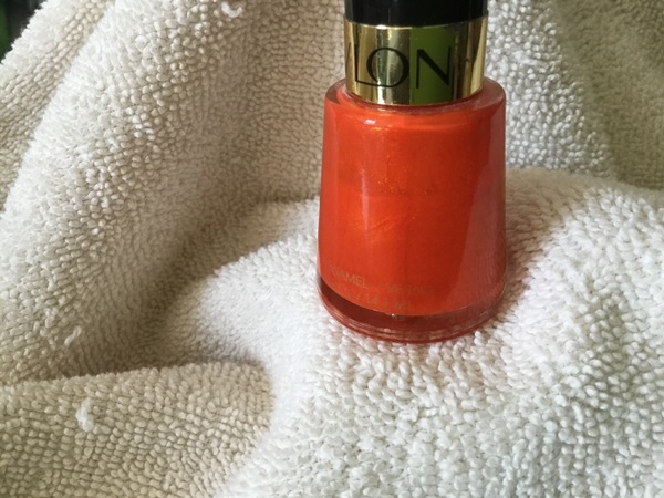 Nail polish swatch / manicure of shade Revlon Orange Flame