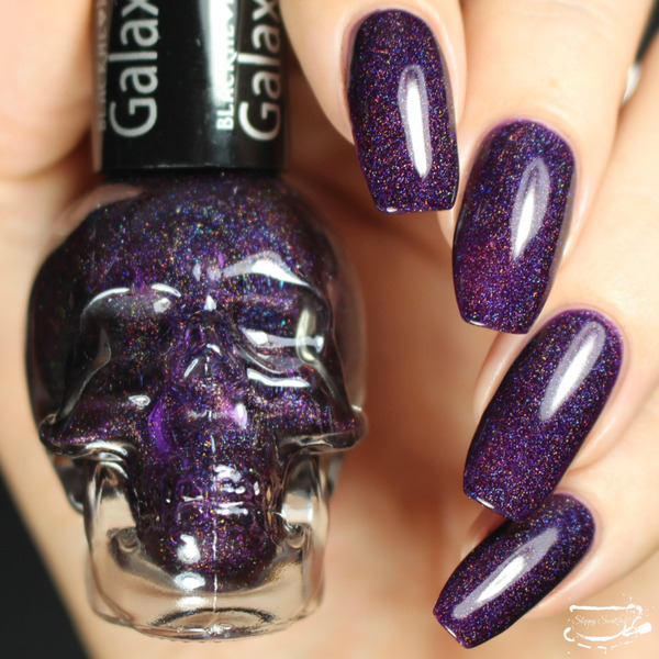 Nail polish swatch / manicure of shade Blackheart Dark Purple Galaxy