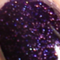 Nail polish swatch of shade Nubar Purple Rain Glitter