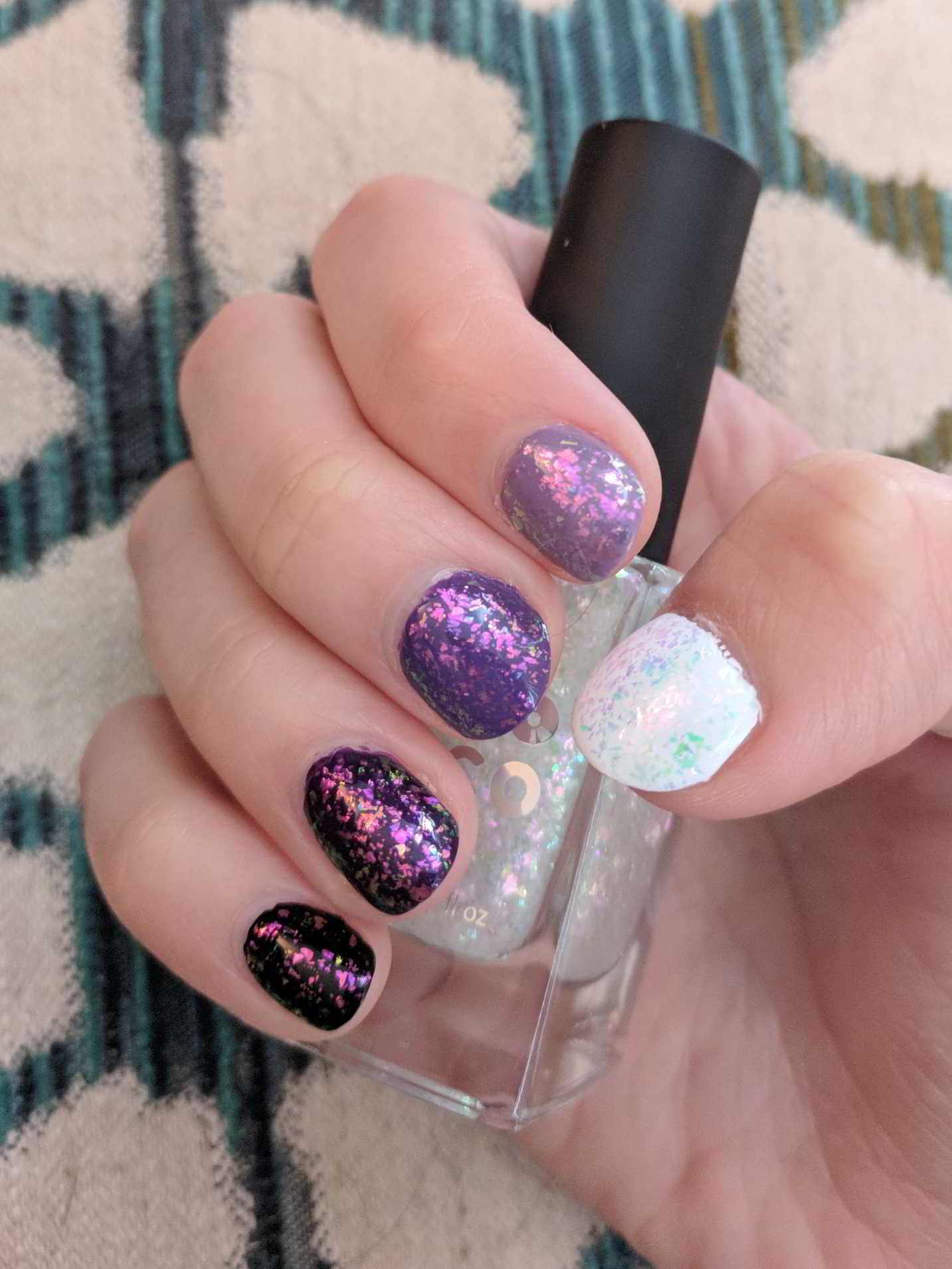 Nail polish manicure of shade OPI Glitter Off, Holo Taco Not Milky White,Sinful Colors Shock Candy,Zoya Mira,OPI Vampsterdam,Holo Taco One-Coat Black,Holo Taco Cosmic Unicorn Skin,Holo Taco Super Glossy Taco