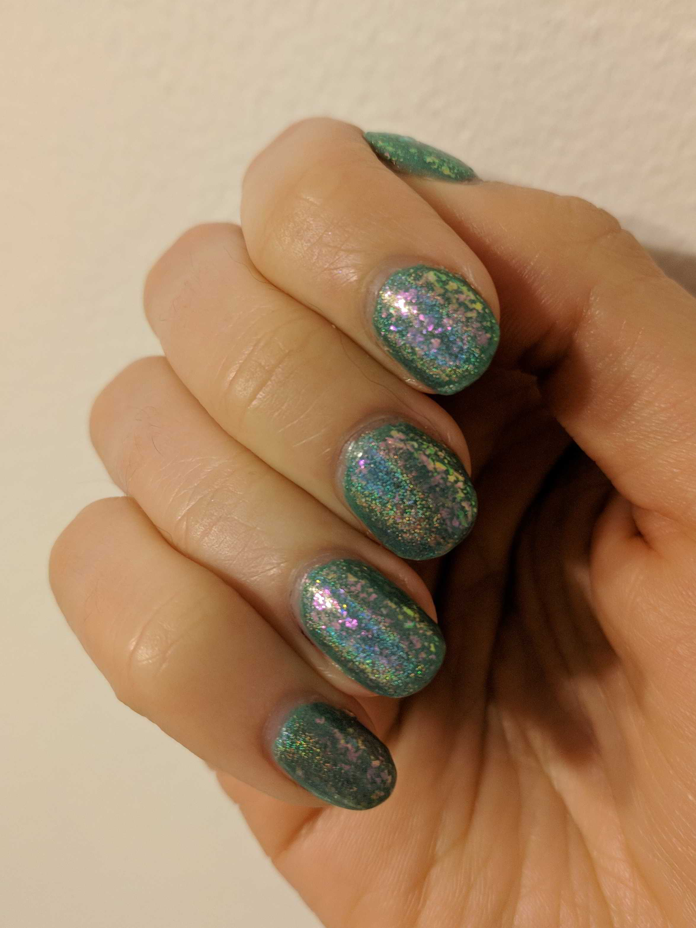 Nail polish manicure of shade OPI Glitter Off, Sinful Colors Mint Apple,Holo Taco Cosmic Unicorn Skin,Piper Polish SpectraFlair Topcoat,Jordana Quick Shine Top Coat