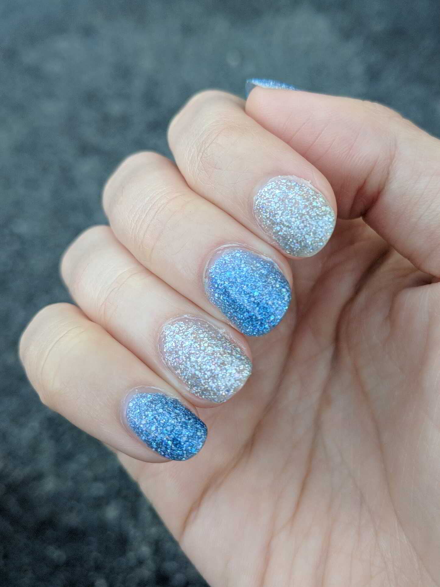 Nail polish manicure of shade OPI Glitter Off, Holo Taco Rainbow Snow,Holo Taco Frost Light,Jordana Quick Shine Top Coat