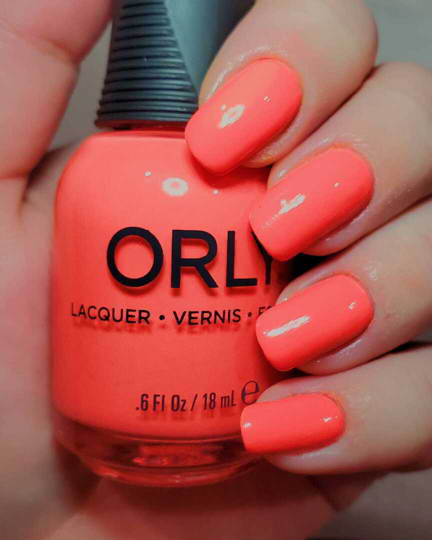 Nail polish manicure of shade Orly Artificial Orange