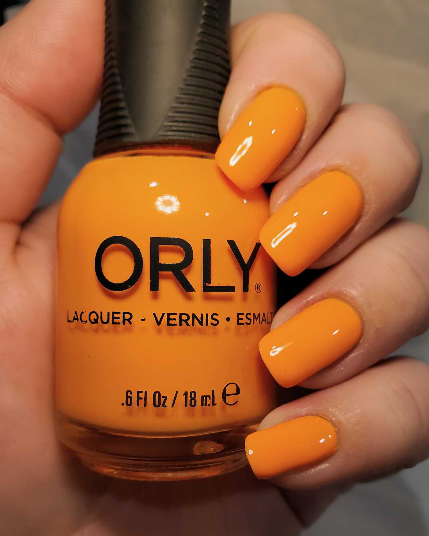 Nail polish manicure of shade Orly Tangerine Dream