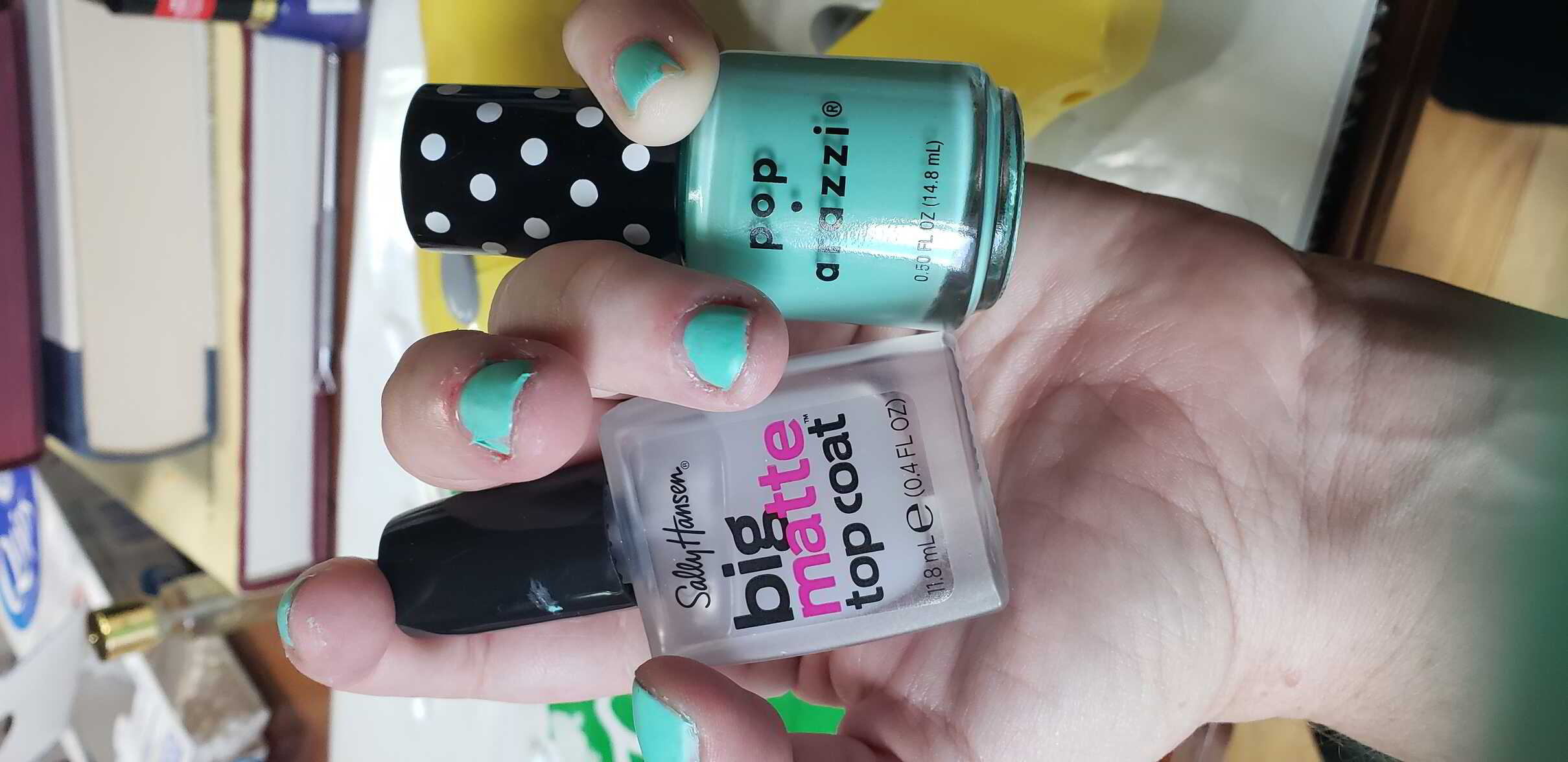 Nail polish manicure of shade Pop-arazzi Mint No More, Sally Hansen Big Matte Top Coat