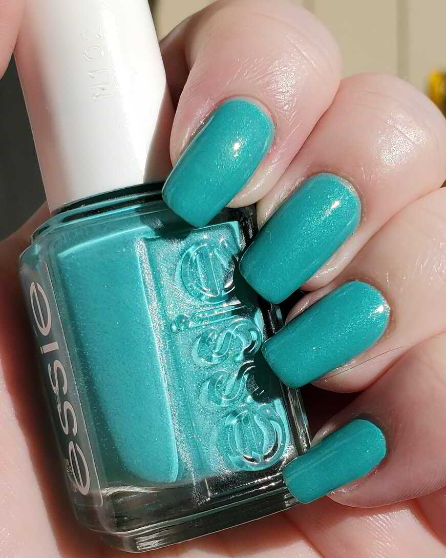 Nail polish manicure of shade essie Viva antigua!