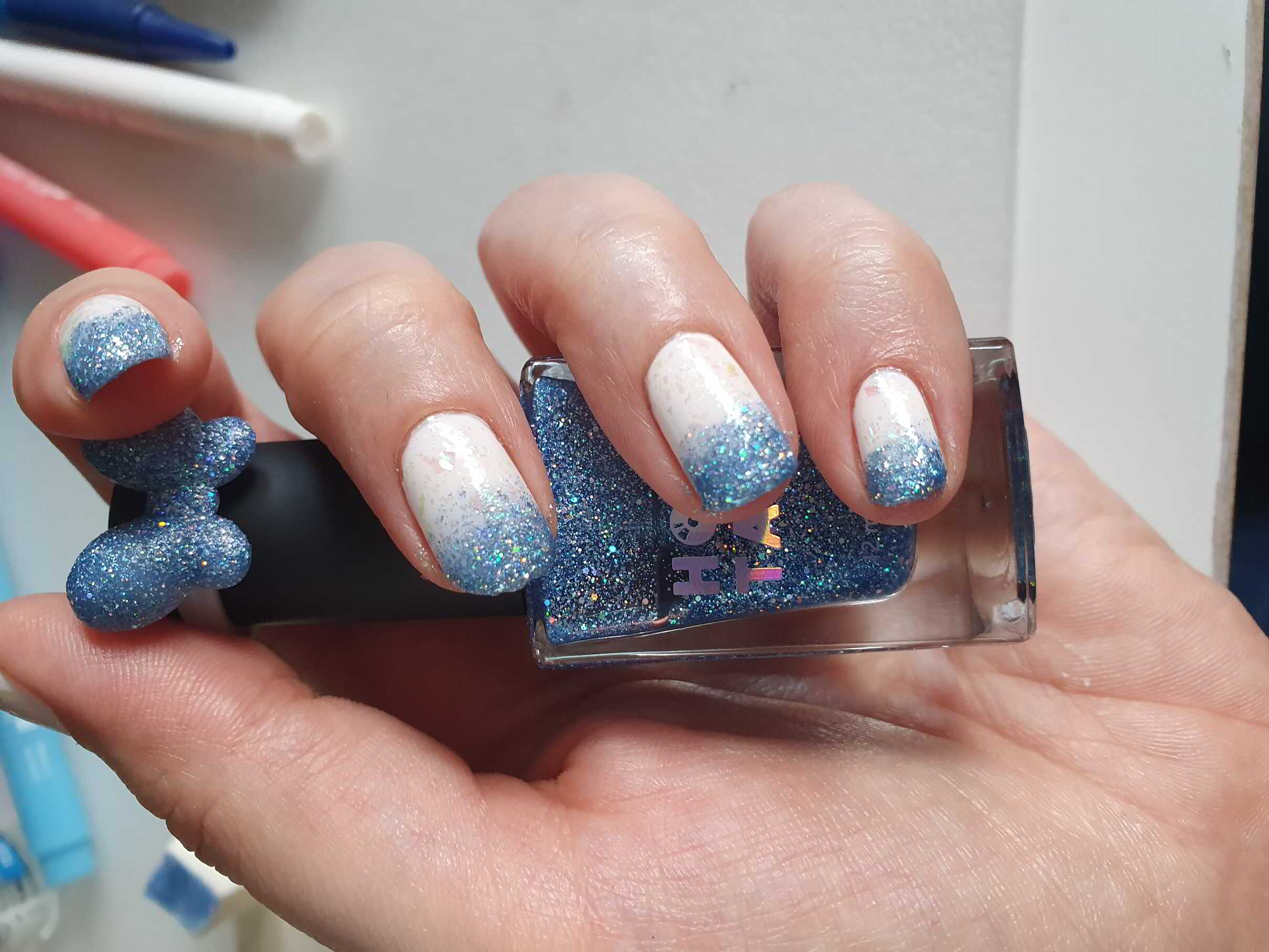 Nail polish manicure of shade Holo Taco Lunar Unicorn Skin, essie Fiji,Holo Taco Frost Light