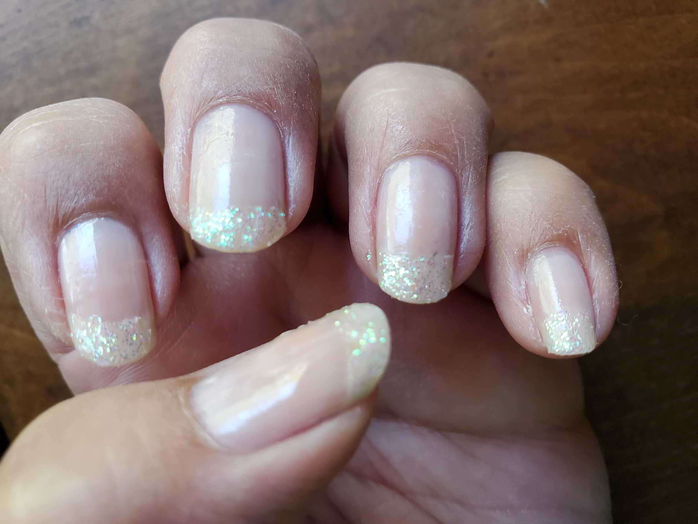 Nail polish manicure of shade Sally Hansen My Sheer, Sally Hansen Twinkle Snows
