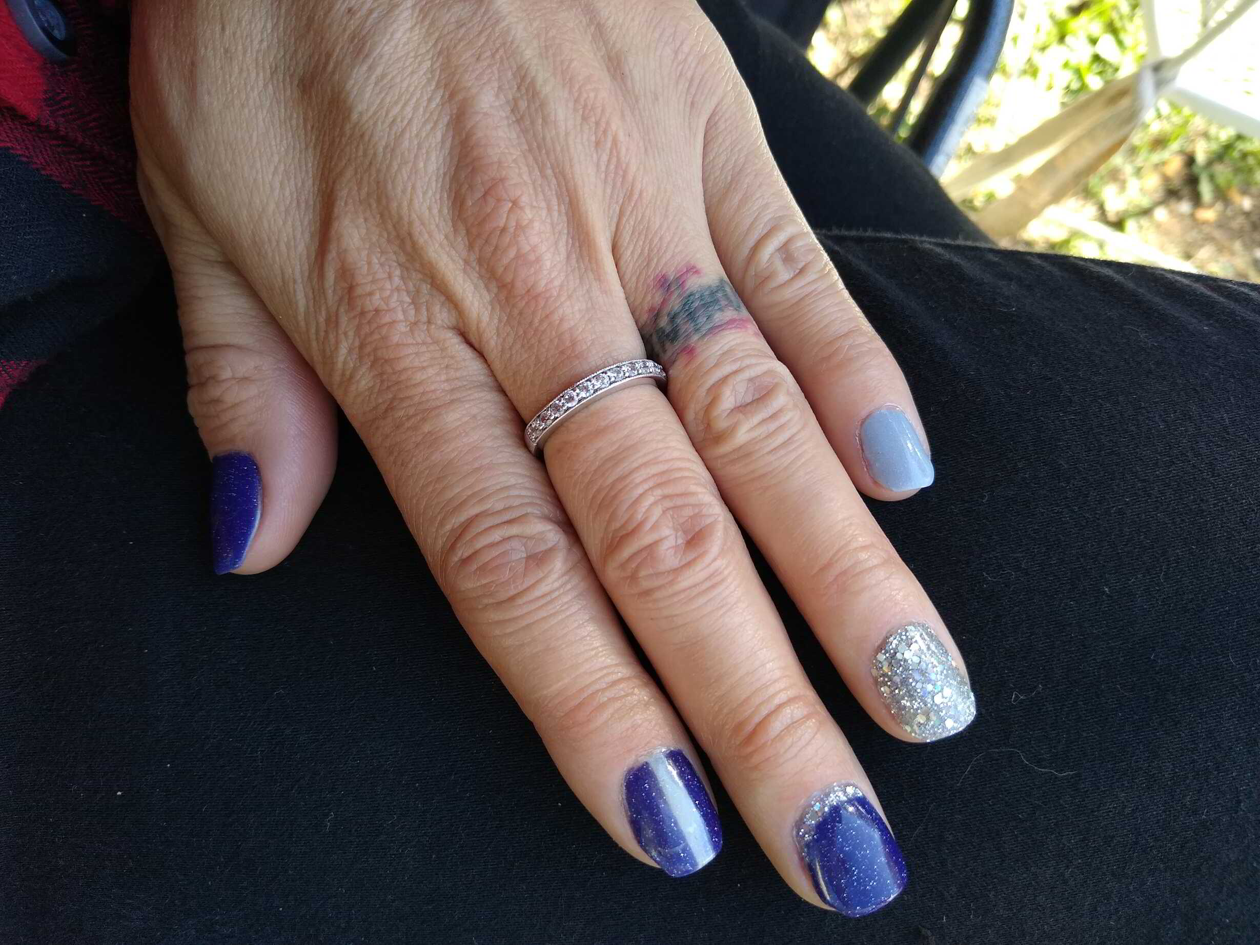 Nail polish manicure of shade Revel Windchill, Revel Frostbite,Revel Silver Bells