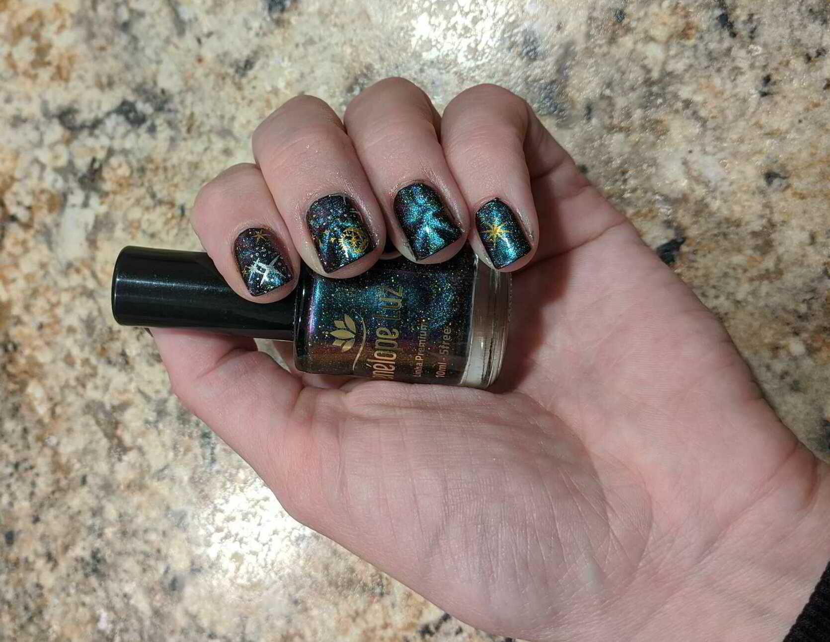 Nail polish manicure of shade Penelope Luz Making Magic