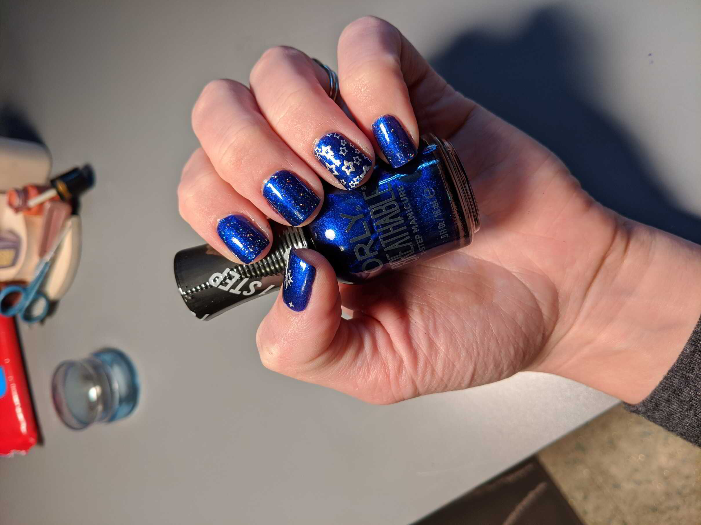 Nail polish manicure of shade Orly You're on Sapphire