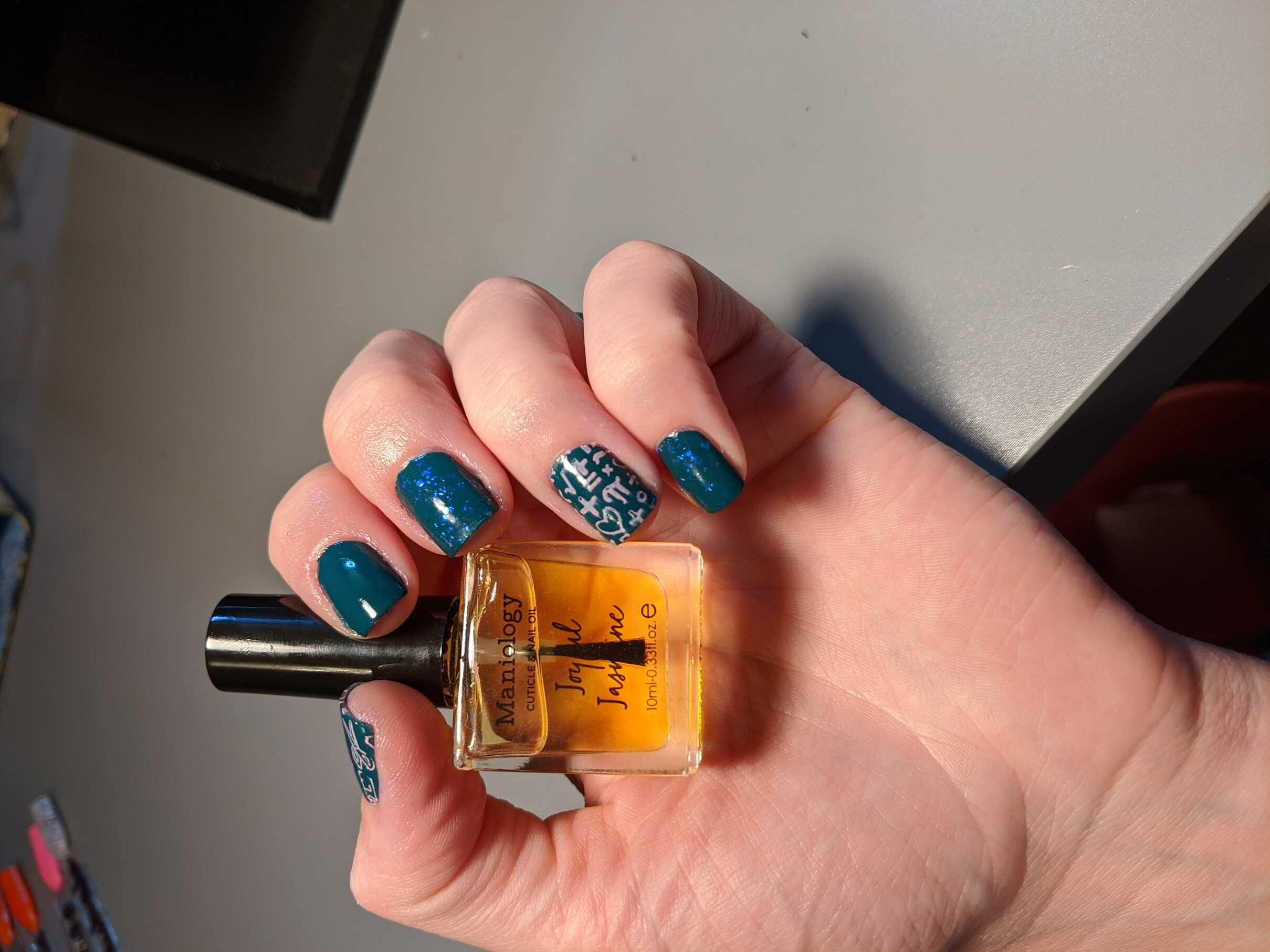 Nail polish manicure of shade Holo Taco Bring Me The Teal