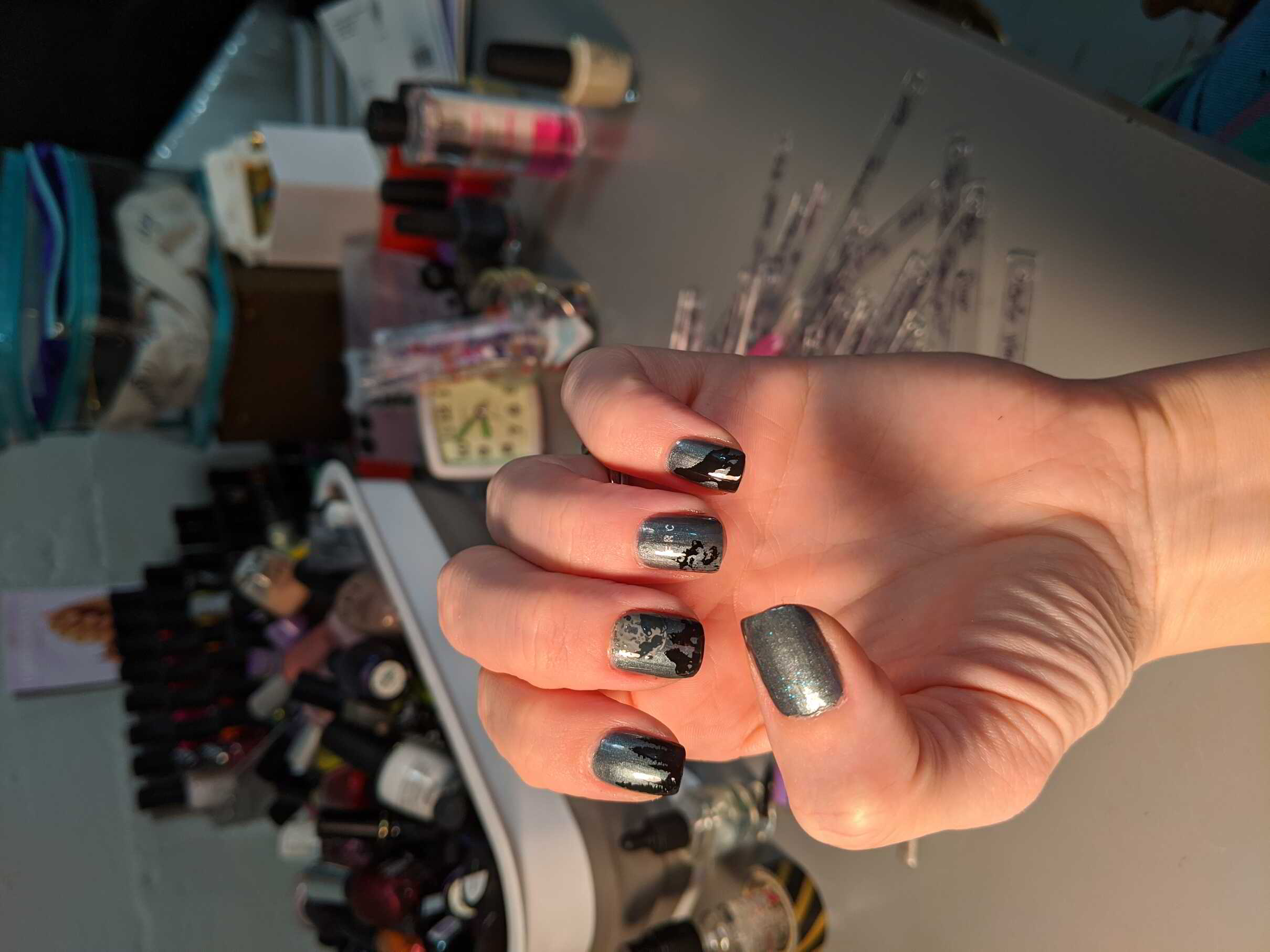 Nail polish manicure of shade Sally Hansen Stormy Blue