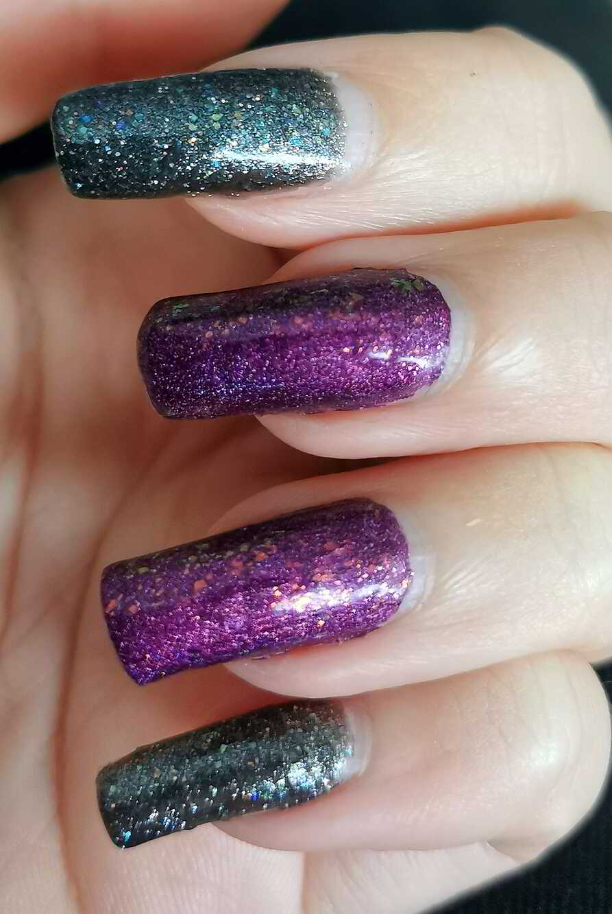 Nail polish manicure of shade OPI DS Titanium, OPI My Color Wheel is Spinning,essence Glamaxy far, far away