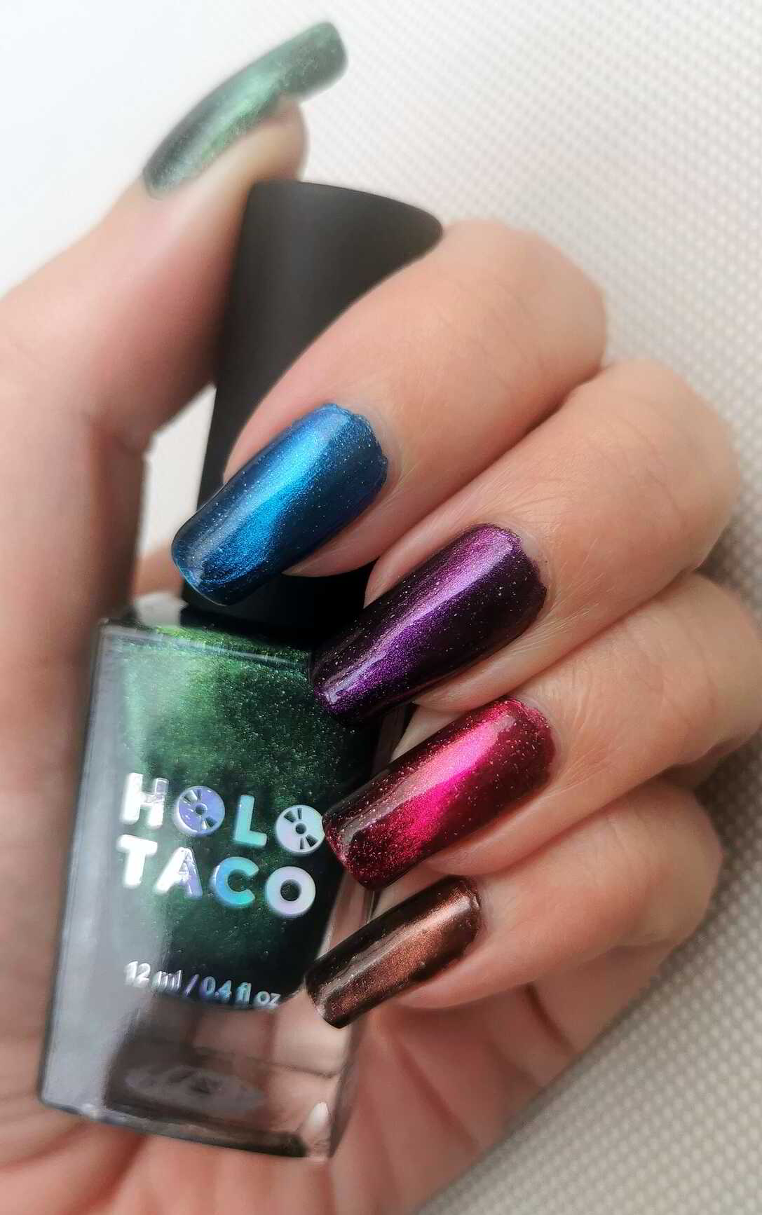 Nail polish manicure of shade Holo Taco Love Spell, Holo Taco Wicked Potion,Holo Taco Twice In A Blue Moon,Holo Taco Fairy Tail,Holo Taco Queen's Curse