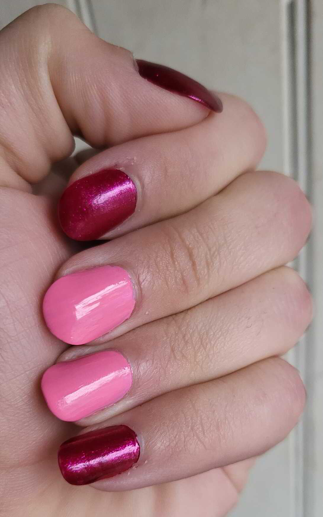 Nail polish manicure of shade OPI The One That Got Away, OPI Racing for Pinks,OPI Top Coat
