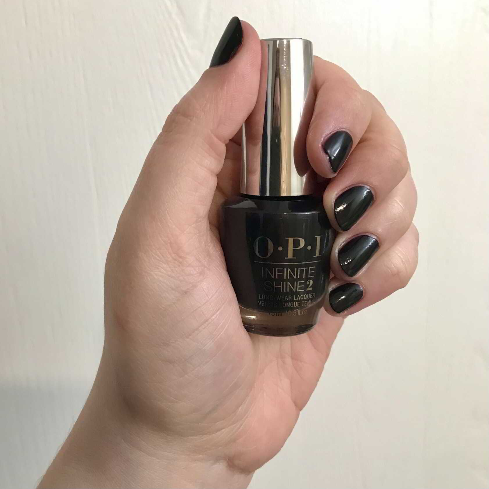 Nail polish manicure of shade OPI Infinite Shine Lincoln Park After Dark