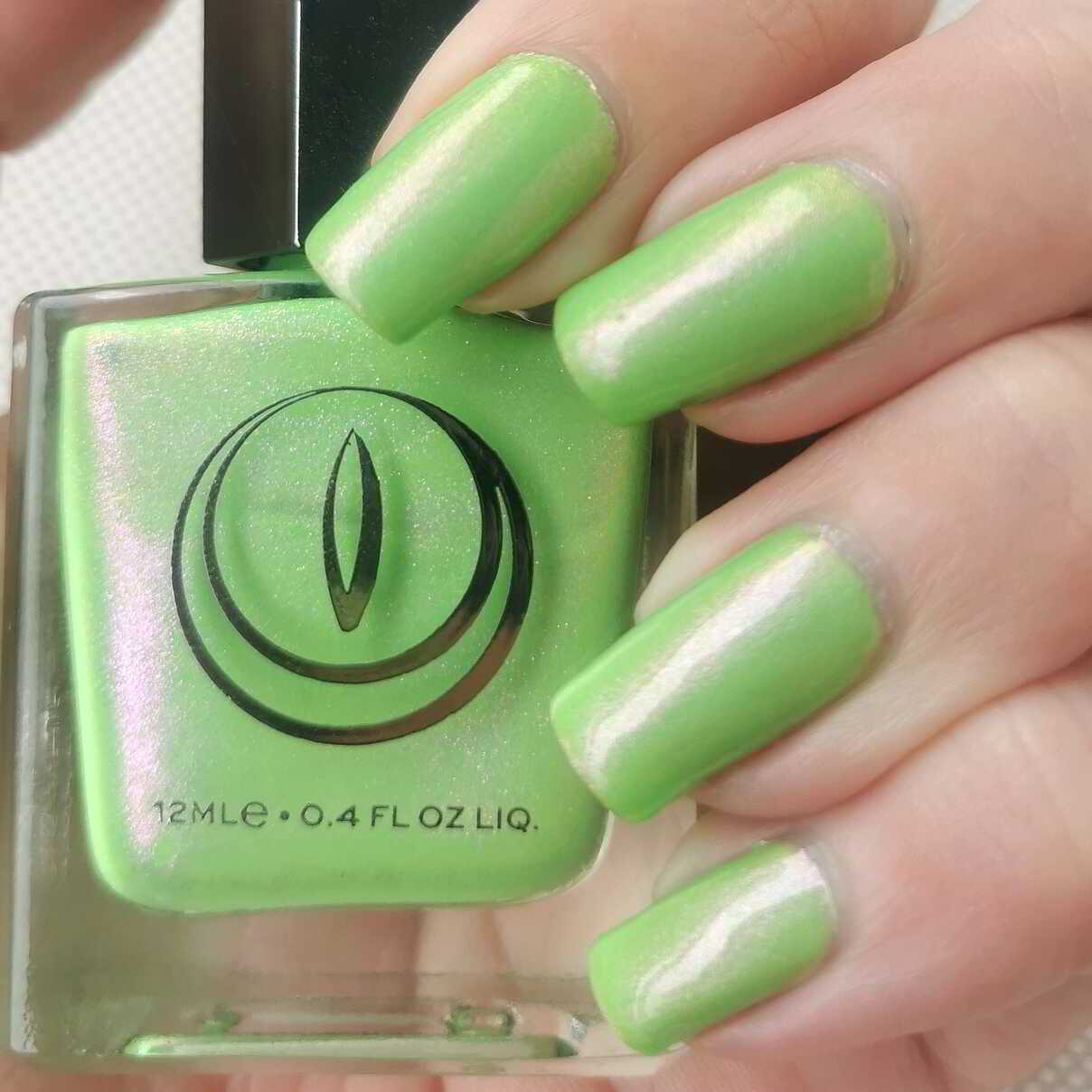 Nail polish manicure of shade Mooncat Apple Of My Eye, 