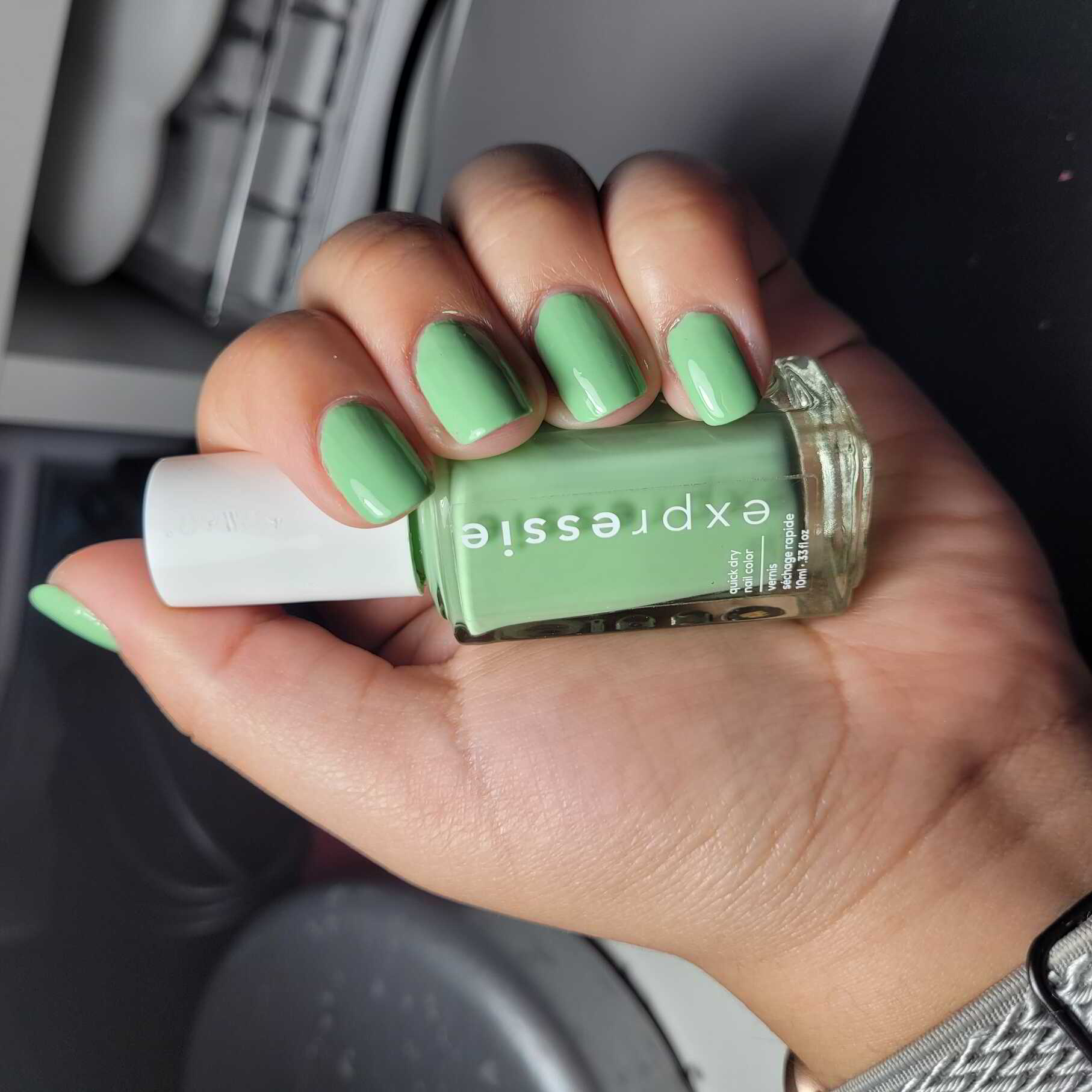 Nail polish manicure of shade essie Express to Impress, 