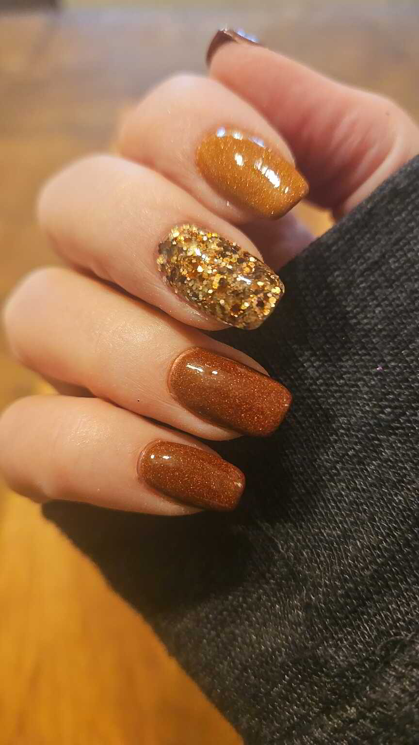 Nail polish manicure of shade Revel Apple Peel, Revel Bonfire,Revel Sweater Weather