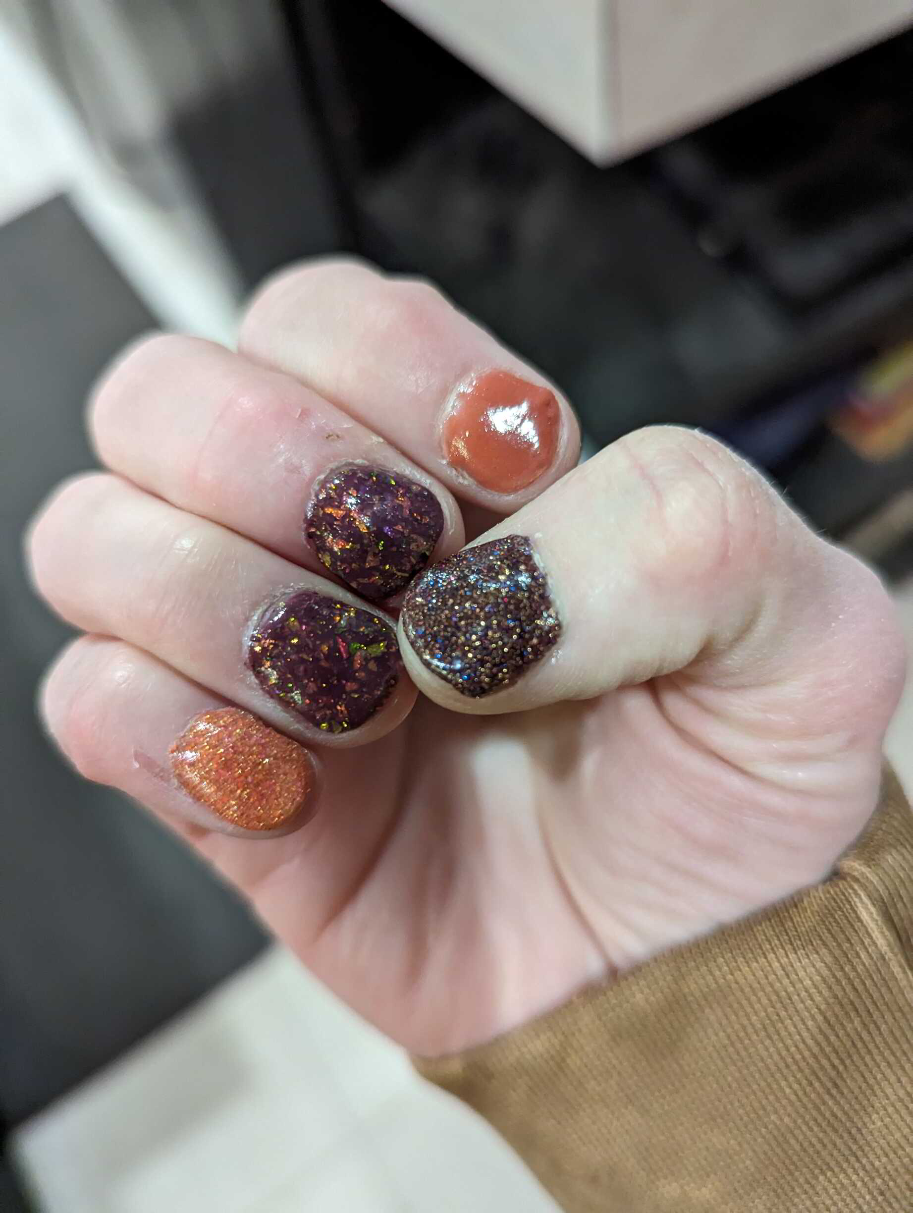 Nail polish manicure of shade Revel Night Fall, Revel Candy Apple,Revel Autumn Glory,Revel PSL