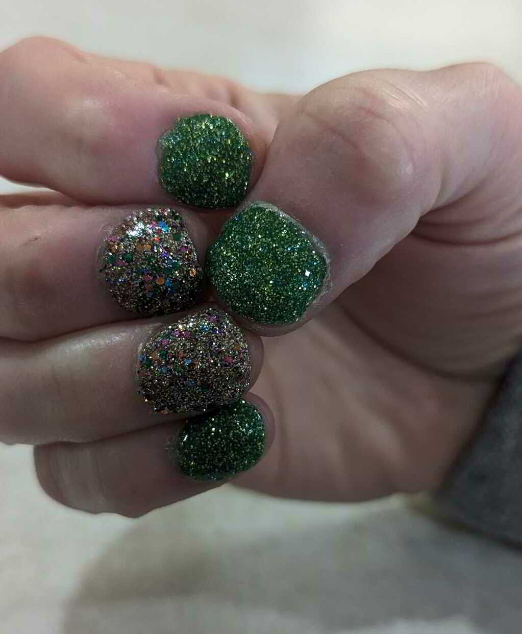 Nail polish manicure of shade Revel Shamrock, Revel Lucky, 