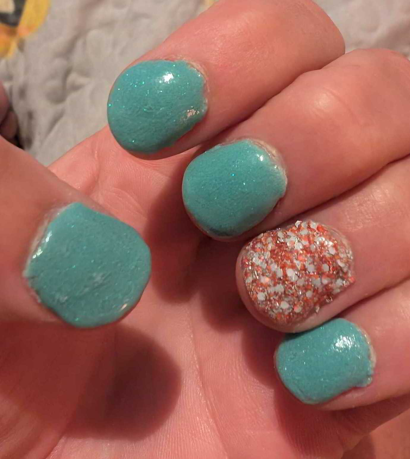 Nail polish manicure of shade Revel Studs and Spurs, Revel Turquoise Trails,Revel Vivien