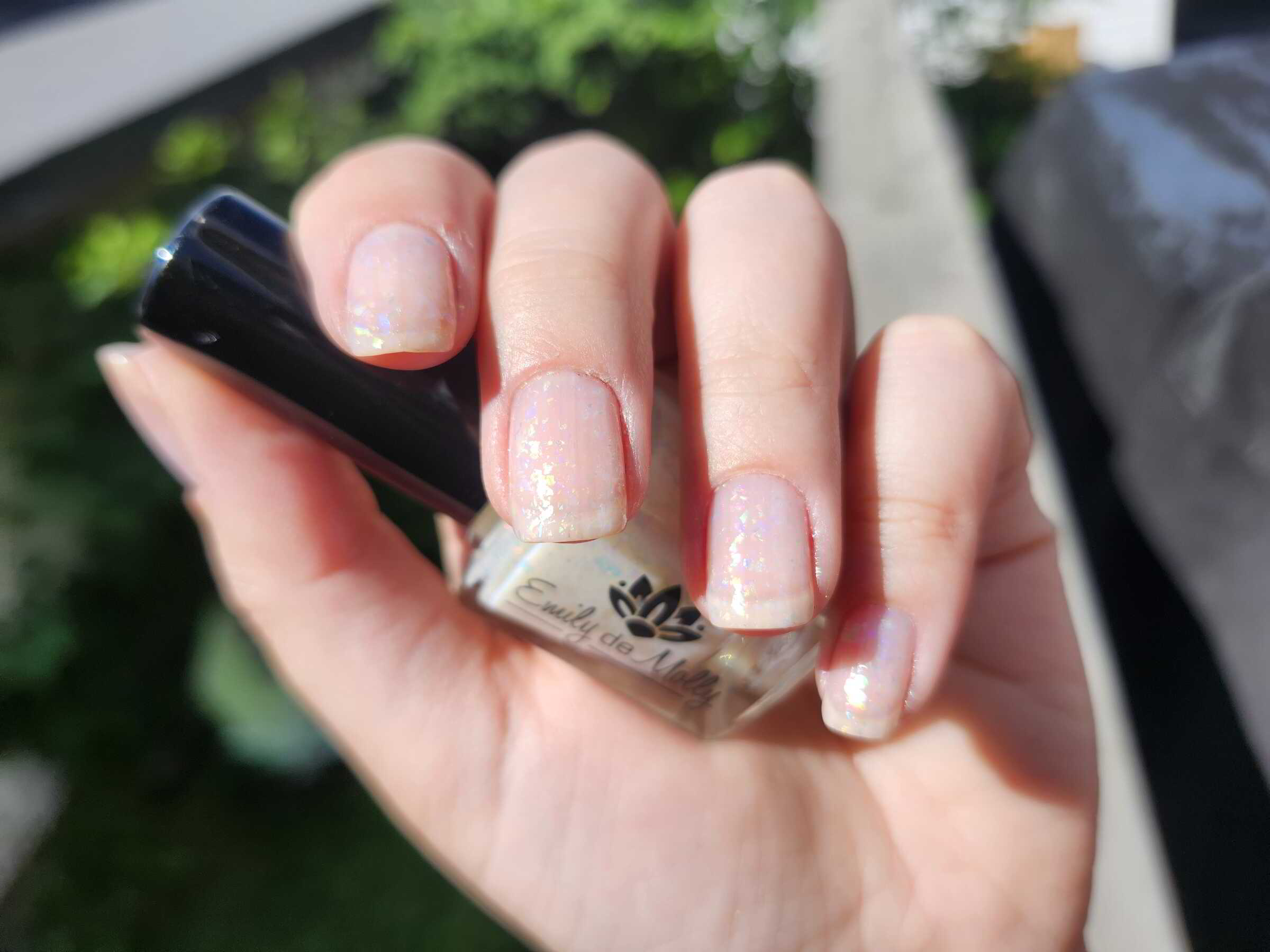 Nail polish manicure of shade Emily de Molly Sheer Tint Opal, 