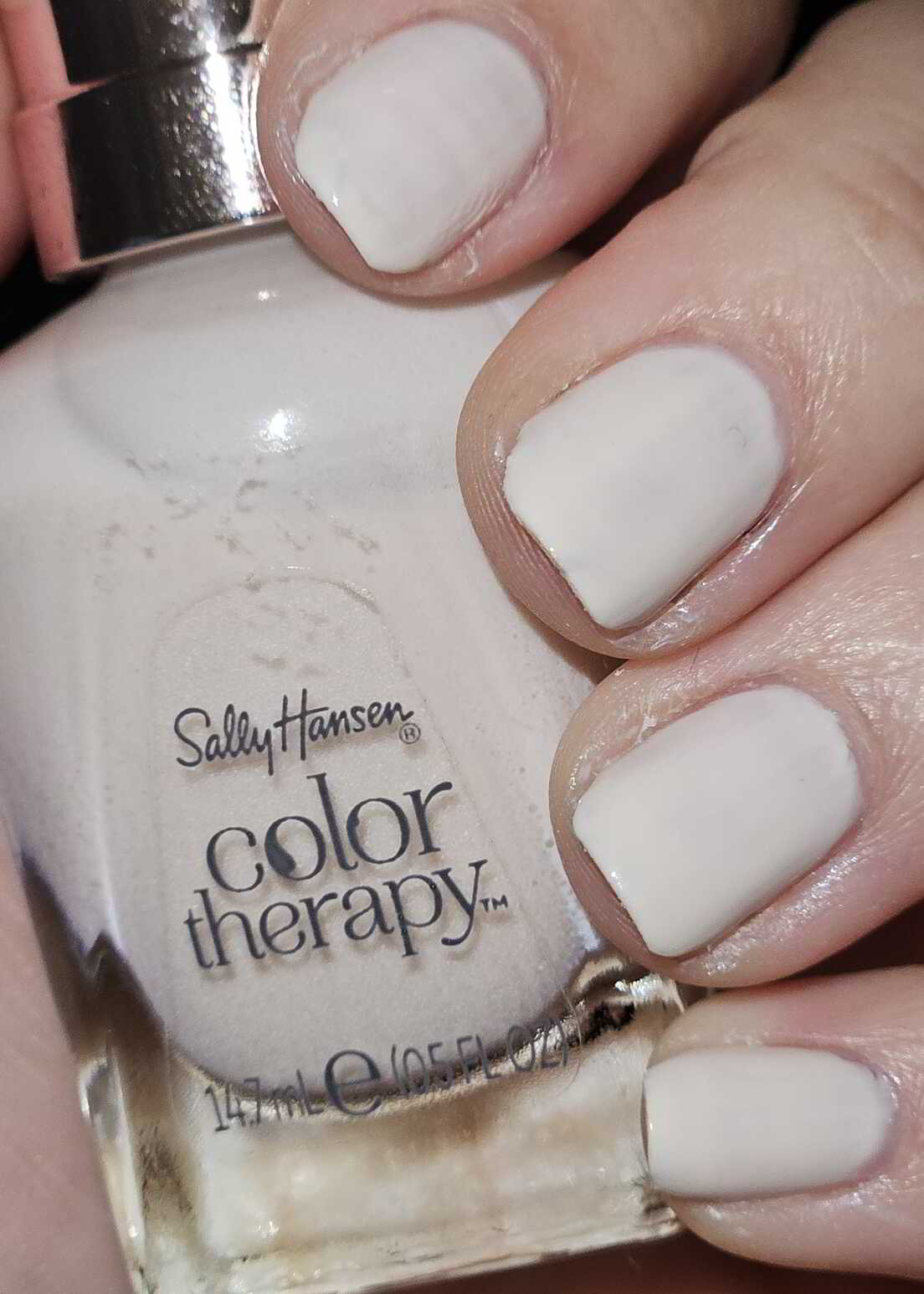 Nail polish manicure of shade Sally Hansen Color Therapy Sheer nirvana, 