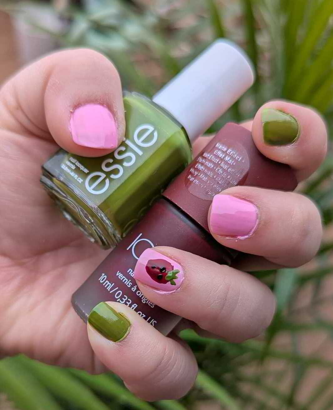 Nail polish manicure of shade essie Willow in the Wind, L.A. Colors Girl talk, Icing 33189, Sinful Colors Black on Black, 