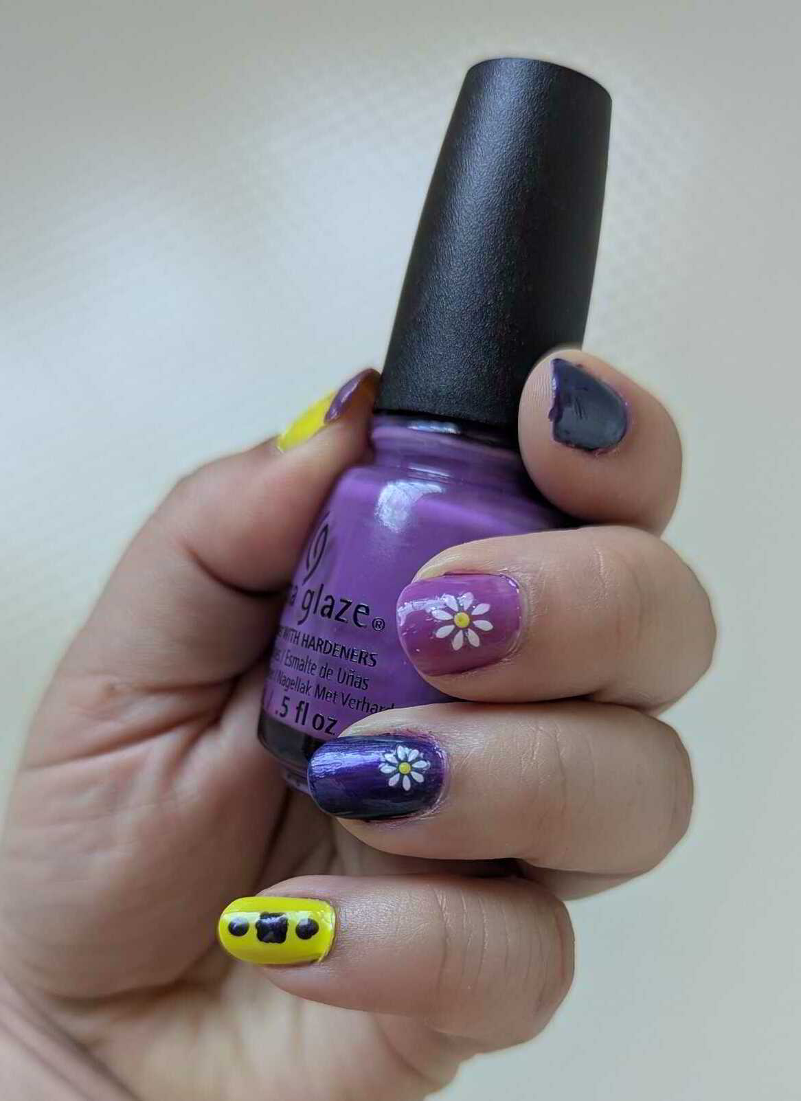 Nail polish manicure of shade China Glaze Plur-ple, Sally Hansen Insta-Dri Yell-Whoa!,Julep Heidi,OPI Top Coat
