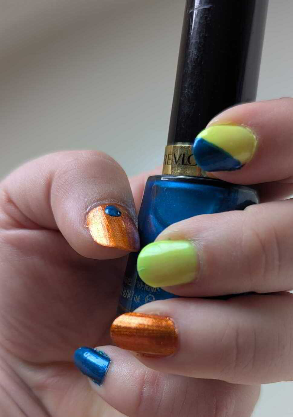 Nail polish manicure of shade Revlon Mysterious, L.A.Colors Day Glow, Kleancolor Metallic Orange, 