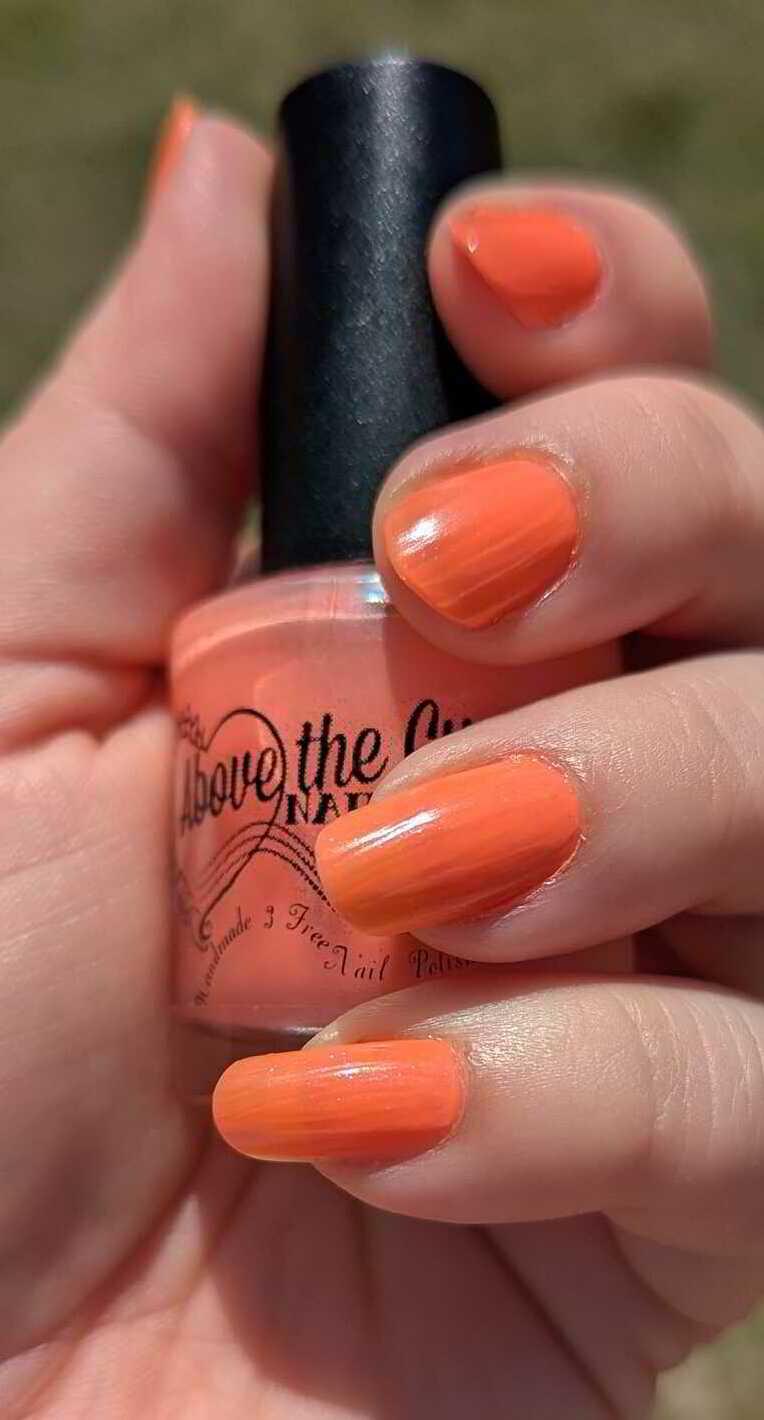 Nail polish manicure of shade Above the Curve Neon Red