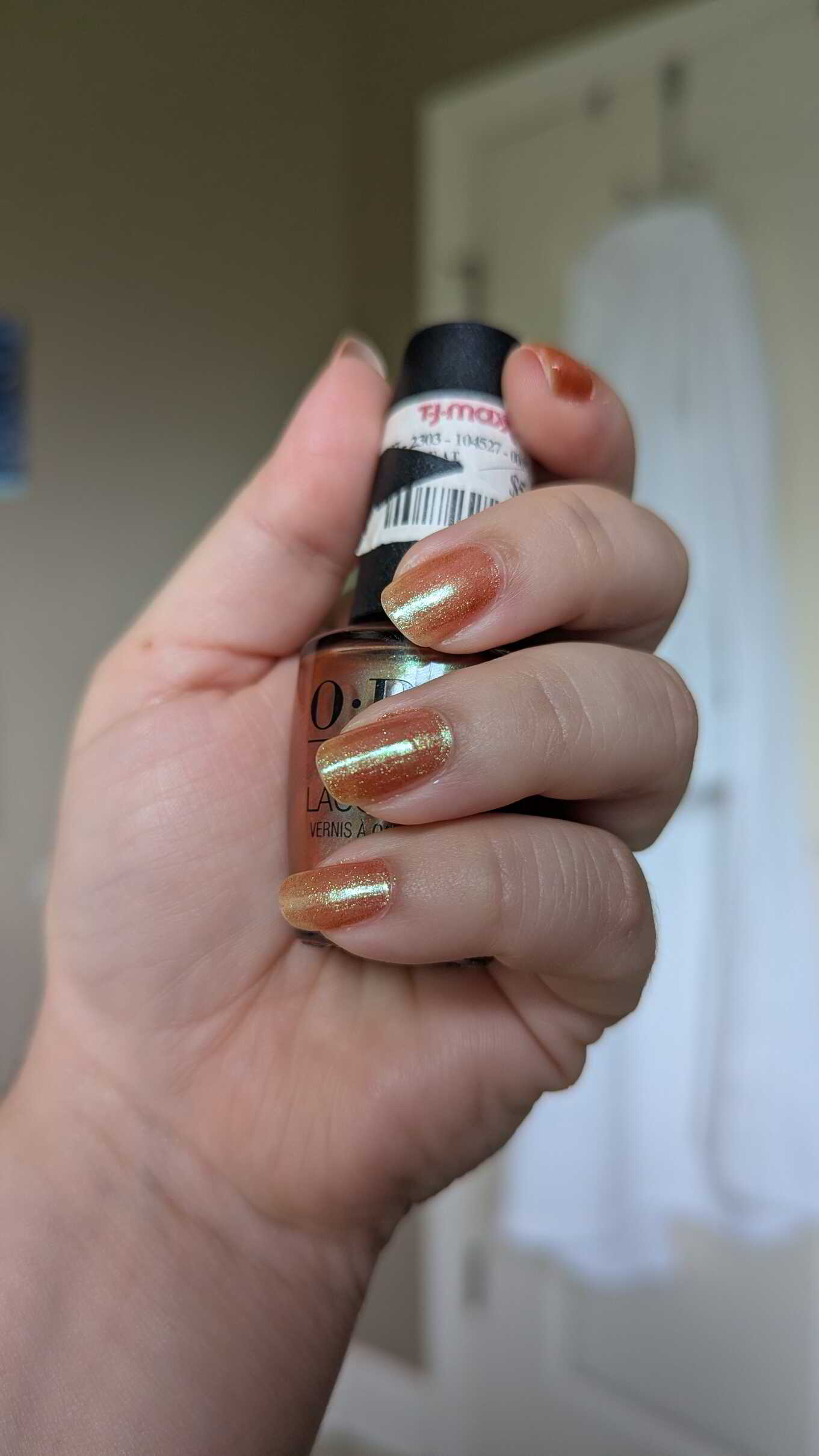 Nail polish manicure of shade OPI Virgoals, OPI Top Coat