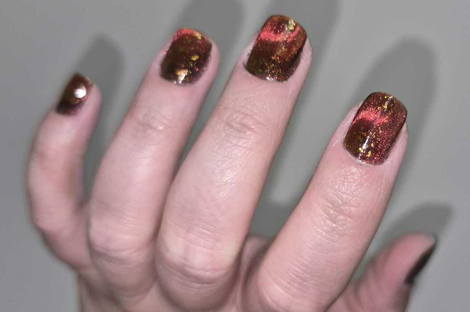 Nail polish manicure of shade Emily de Molly Green Flame
