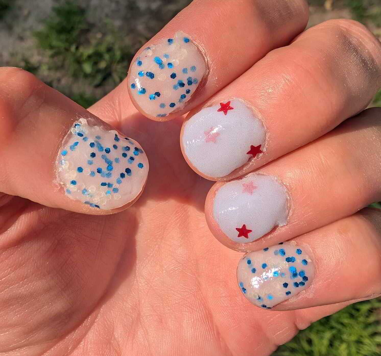 Nail polish manicure of shade Revel Vivien, Revel Patriot, Revel Anthem, 