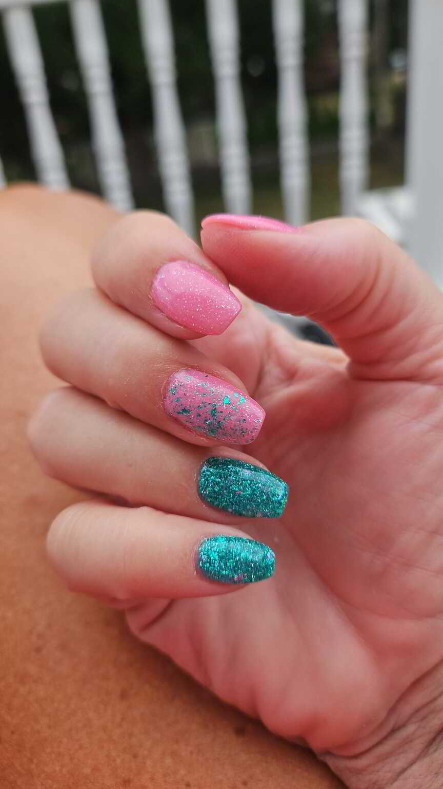 Nail polish manicure of shade Revel Jamaica, Revel Oasis