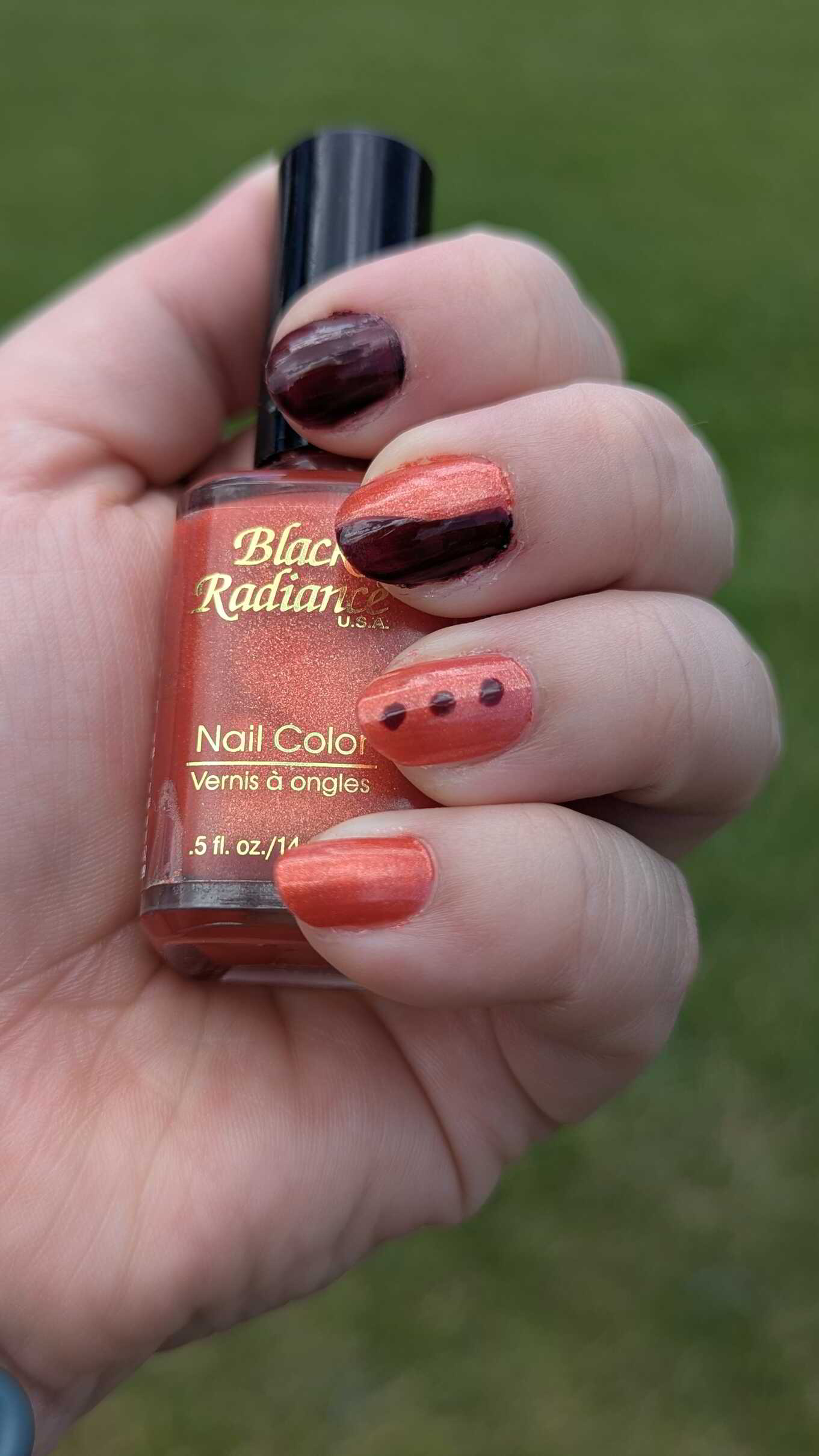 Nail polish manicure of shade Black Radiance Sparkling Orange, SpaRitual I Feel The Earth Move, 