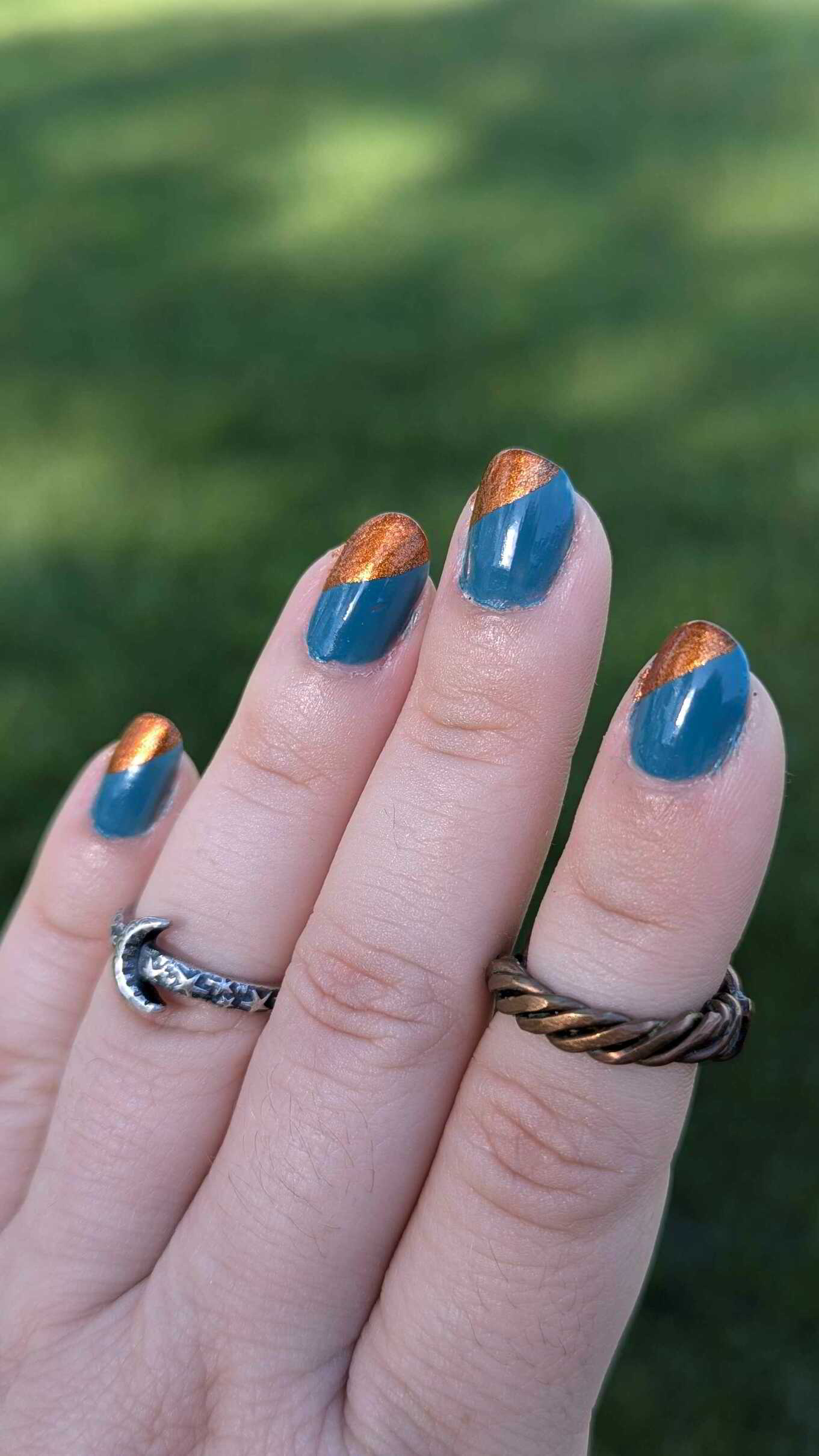 Nail polish manicure of shade Avon Fast Time Teal, Kleancolor Metallic Orange, OPI Top Coat, 