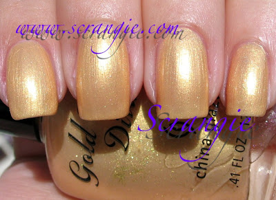 Nail polish swatch / manicure of shade China Glaze Dripping in Gold