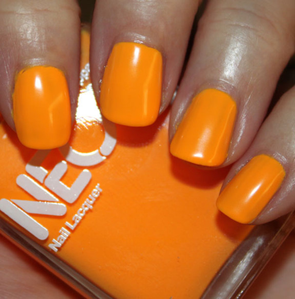 Nail polish swatch / manicure of shade American Apparel Neon Orange
