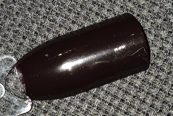 Nail polish swatch / manicure of shade essie Wicked