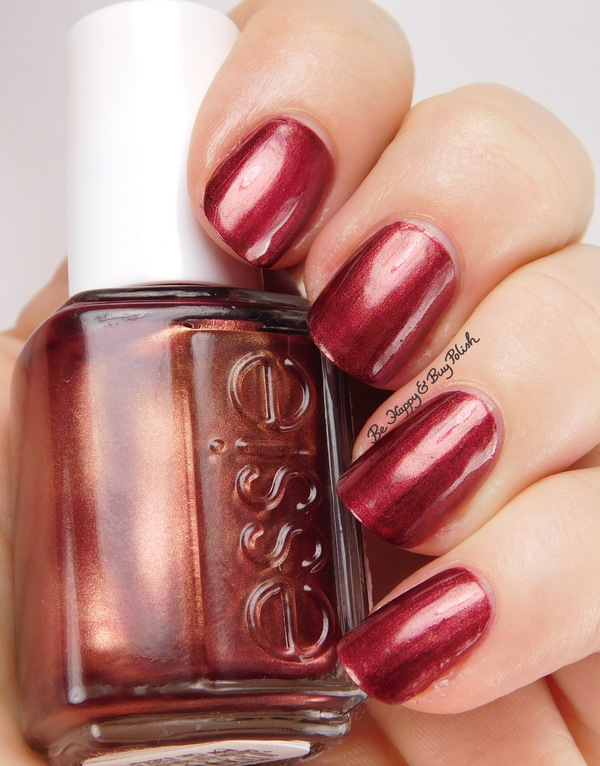 Nail polish swatch / manicure of shade essie Wrapped in Rubies