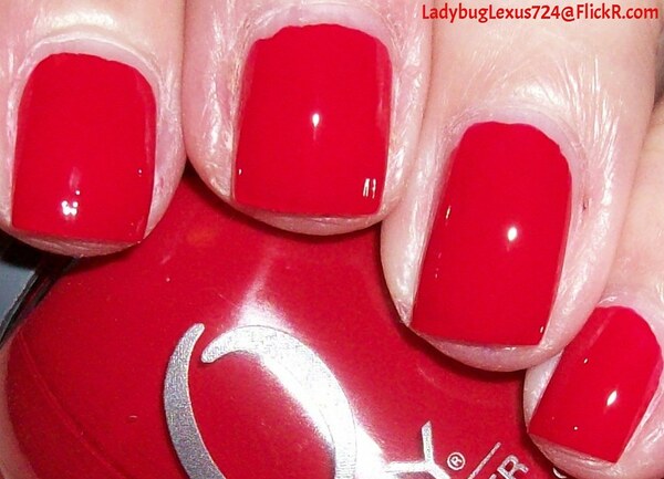 Nail polish swatch / manicure of shade Orly Down Right Red