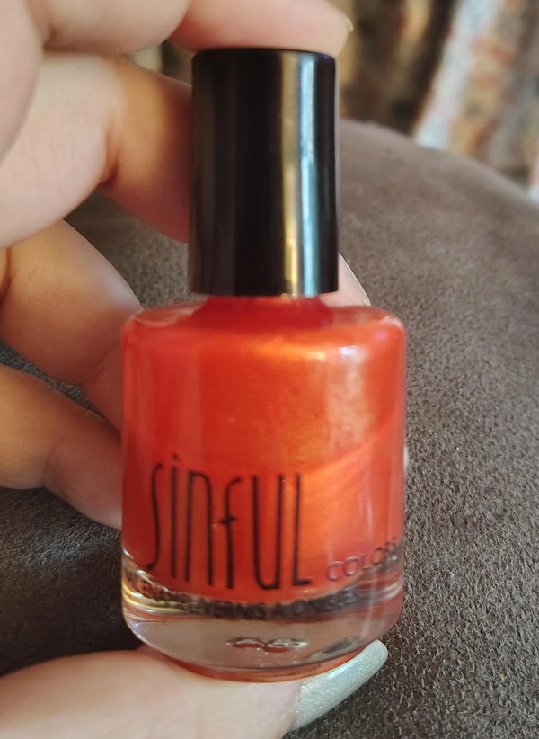 Nail polish swatch / manicure of shade Sinful Colors Courtney Orange