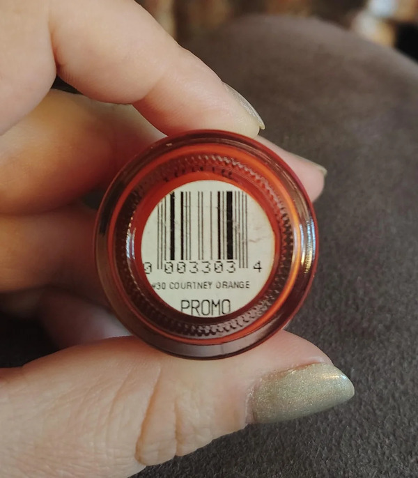 Nail polish swatch / manicure of shade Sinful Colors Courtney Orange